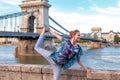 Young woman doing yoga at Danube in city, Budapest, Hungary Royalty Free Stock Photo