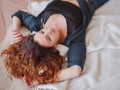 young woman enjoys the morning silence in her room Royalty Free Stock Photo