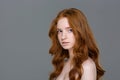 Young redhead woman looking at camera Royalty Free Stock Photo