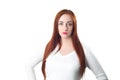 Young redhead woman portrait with disgust face expression Royalty Free Stock Photo