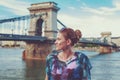 Young redhead woman posing at Chain Bridge, Budapest, Hungary Royalty Free Stock Photo