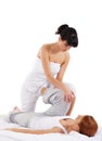 A young redhead woman on a Thai massage Royalty Free Stock Photo