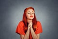 Young woman praying god for something eyes closed in hope Royalty Free Stock Photo