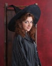 Young redheaded witch Royalty Free Stock Photo