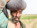 A young refugee child is sleeping on the shoulder of his father and both looks so tired hungry and terrified