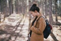 Young regnant woman posing in autumn park Royalty Free Stock Photo