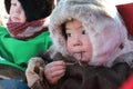 Young reindeer herders in winter in national fur clothes in the north of Siberia