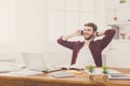 Young relaxed businessman has a mobile talk in modern white office Royalty Free Stock Photo