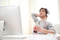 Young relaxed man listenning music at the office Royalty Free Stock Photo