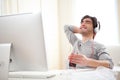 Young relaxed man listenning music at the office Royalty Free Stock Photo