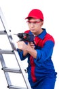 The young repairman with drill perforator isolated on white