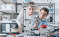 Young researchers and 3D printer Royalty Free Stock Photo