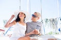 Young, rich and attractive couple on a sailing boat Royalty Free Stock Photo