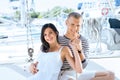 Young, rich and attractive couple on a sailing boat Royalty Free Stock Photo