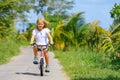 Young rider kid in riding bicycle Royalty Free Stock Photo