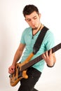 Young rocker with bass player with turquoise t shirt Royalty Free Stock Photo