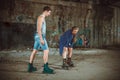 Young roller couple on graffiti background Royalty Free Stock Photo