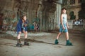 Young roller couple on graffiti background