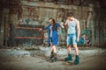 Young roller couple on graffiti background