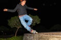 A young roller practicing tricks on the skating rinks