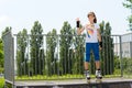 Young roller skater giving a Perfect gesture Royalty Free Stock Photo