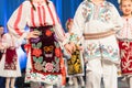 Young Romanian dancers perform a folk dance in traditional folkloric costume. Folklore of Romania Royalty Free Stock Photo