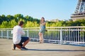 Young romantic couple having a date near the Eiffel tower Royalty Free Stock Photo