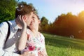 Young romantic couple kissing with love in summer park. Royalty Free Stock Photo
