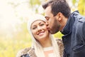 Young romantic couple kissing in the park in autumn Royalty Free Stock Photo