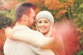 Young romantic couple in the park in autumn Royalty Free Stock Photo