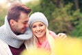Young romantic couple in the park in autumn Royalty Free Stock Photo