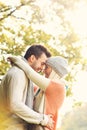 Young romantic couple in the park in autumn Royalty Free Stock Photo