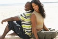 Young Romantic Couple Relaxing On Beach Together Royalty Free Stock Photo
