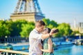 Young romantic couple spending their vacation in Paris Royalty Free Stock Photo