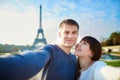 Young romantic couple taking funny wide angle selfie Royalty Free Stock Photo