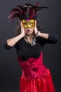 Young romany woman wonder on carnaval with mask