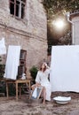 Young rural woman washing clothes in a washbasin Royalty Free Stock Photo