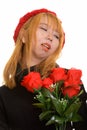 Young sad Asian woman holding red roses and looking away Royalty Free Stock Photo