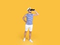 Young sailor with binoculars on yellow background Royalty Free Stock Photo