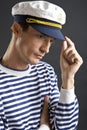 Young sailor man with white cap
