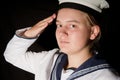 Young sailor saluting isolated white background Royalty Free Stock Photo