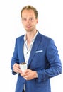 Young salesman promoting coffee beans in cup