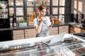 Saleswoman working at the cafe or confectionery shop Royalty Free Stock Photo