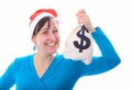 Young santa girl with money sack