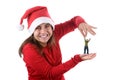 Young santa woman holding small funny person