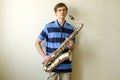 Young saxophonist plays tenor saxophone