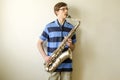 Young saxophonist plays tenor saxophone