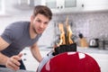 Young Scary Man Looking At Slice Of Burn