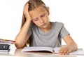 Young school student girl looking unhappy and tired in education Royalty Free Stock Photo