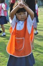 Young school student in Thailand dancing